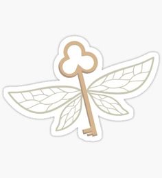 a key with leaves on it is shown in the shape of a flower sticker