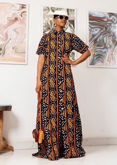 This sophisticated unlined kaftan with yellow & black colors of traditional African ankara fabric, is that stately piece you need to make a grand impression! The kaftan can be worn as evening wear to various events such as weddings, dinner parties and other formal occasions. Long Kaftan Dress African, Printed Tunic Maxi Dress For Festivals, Festival Tunic Maxi Dress Printed, Traditional Printed Patterned Maxi Dress, Traditional Patterned Printed Maxi Dress, Traditional Printed Floor-length Maxi Dress, Yellow Printed Long Maxi Dress, Yellow Long Printed Maxi Dress, Printed Tunic Maxi Dress