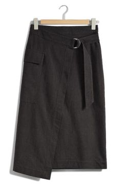 An adjustable D-ring belt and cargo pocket add utilitarian elements to a nonstretch midi skirt finished with an asymmetric hem for contemporary appeal. Attached belt Cargo flap-patch pocket 55% hemp, 45% cotton Dry clean or machine wash, line dry Imported Black Skirt With Belt Detail For Work, Black Workwear Skirt With Belt Detail, High Waist Cargo Skirt For Fall Workwear, Utility Skirt With Pockets For Work, High-waisted Cargo Skirt For Workwear, High-waist Black Cargo Skirt For Work, Black High-waist Cargo Skirt For Work, High Waist Cargo Skirt With Cargo Pockets For Work, High Waist Cargo Skirt For Work