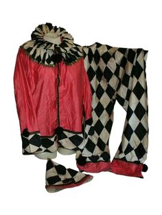 a clown outfit and slippers are shown on a white background with black and white checkers