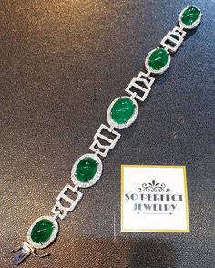 "A DREAM COMES TRUE! Gorgeous masterpiece! ONE OF A KIND Bracelet! Featuring 7 pieces of extra fine GLOWING VIVID GREEN Zambian Emerald weighting a total of 58.94 carats... and 334 pieces of SUPER SPARKLING, top-grade, F/VS Diamonds (4.01 carat in total). SET IN ONE-OF-A-KIND 18K Solid White Gold, meticulously designed and handcrafted BRACELET! A true heirloom piece that can transcend beyond times and eras.... JUST FINISHED, HANDMADE BY OUR GOLDSMITHS! DAZZLING GENUINE EMERALDS! Extremely rare, Luxury Silver Tennis Bracelet With Emeralds, Silver Emerald Tennis Bracelet For Formal Occasions, Elegant Silver Tennis Bracelet With Emeralds, Elegant Silver Emerald Tennis Bracelet, Formal Silver Tennis Bracelet With Emeralds, Formal Silver Emerald Tennis Bracelet, Formal Silver Diamond Bracelet With Emeralds, Luxury Round Emerald Bracelets, Luxury Wedding Bracelet With Cabochon