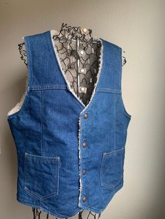 "This classic denim vest was made with quality and style and is in good condition, slight discoloration in back as shown. Four detailed metal buttons and two pockets. Lined with shearling/synthetic shearling for warmth. Very clean. No tag or brand. 21\" armpit to armpit 14\" shoulder to shoulder 24\" collar to hem" Vintage Woolrich, Jeans Button, Denim Jeans Men, Black Denim Jeans, Brown Plaid, Mens Vests, Vest Outfits, Denim Vest, Vintage Jeans