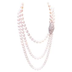 The Following Item we are offering is this Beautiful Rare Important 18KT White Gold Triple Strand South Sea Baroque Pearl and Diamond Necklace. Necklace is comprised of approx 144 Beautiful Magnificent High Luster Large White Baroque SOUTH SEA PEARLS that give off a Radiant Hue!!! Beautifully spread across and adorned with a Fancy Diamond Clasp approx 1CTS! Each Pearl has a Radiant Hue, High Luster with Clarity. The Diamonds are of Exquisite and Fine Quality. This Magnificent Necklace is a Rare Melo Pearl, Pearl Diamond Necklace, Yellow Diamond Necklace, Black Diamond Necklace, Golden South Sea Pearls, Pearl And Diamond Necklace, Fancy Yellow Diamond, Sea Pearl, Fancy Diamonds