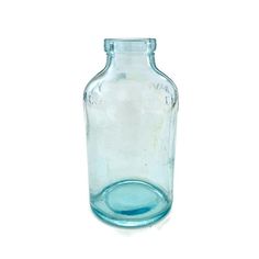 an empty glass bottle is shown on a white background