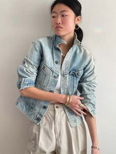 Vintage lee jean jacket made in usa featuring naturally faded soft light wash finish.  fitted at cropped length with breast pockets.    bust 36 waist 34 hips 36 length 23  shoulder 17.5 sleeve 24.5    excellent vintage condition.  model is 5'10 size 2/4 Black Tank Dress, Black Aviators, Vintage Studio, Faded Denim, Lee Jeans, Boyfriend Tee, Denim Jean Jacket, Denim Jackets, Engineered Garments