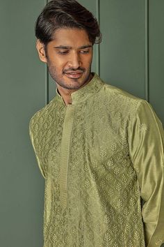 Olive green chanderi kurta with all over floral jaal pattern and tonal resham embroidery. Paired with contrast pyjama. - Aza Fashions Designer Green Silk Sherwani, Traditional Green Silk Sherwani, Festive Green Chanderi Bandhgala, Green Embroidered Chanderi Bandhgala, Green Chanderi Bandhgala With Cutdana, Green Bandhgala With Chikankari Embroidery For Eid, Green Chanderi Sherwani For Eid, Green Semi-stitched Bandhgala With Resham Embroidery, Green Chanderi Sherwani With Traditional Drape