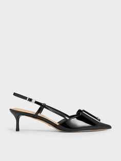 Exude sophistication and femininity with these Lu slingback pumps. Made with shiny patent leather, these versatile black shoes feature large angular bows and short stiletto heels -- they can be dressed up or down, and will look great with both jeans and an evening dress. Their pointed-toe silhouette has a flattering leg-lengthening effect, while their thin slingback straps makes them very easy to put on and take off. Short Stiletto, Leather Bow, Charles Keith, Leather Bows, Slingback Pump, Black Pumps, Evening Dress, Black Shoes, Patent Leather