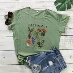 Herbology Plants Colored Print T-shirt Vintage Botanical Mandragora Tshirt Camiseta Aesthetic Women Gardening Graphic Tee Top Green Graphic Tee With Plant Print, Green Graphic Tee With Plants Print, Green Cotton T-shirt With Plant Print, Casual Green Tops With Plant Print, Green Botanical T-shirt With Graphic Print, Botanical Green T-shirt With Graphic Print, Botanical Style Green T-shirt With Graphic Print, Green Botanical Graphic Print Tops, Green Short Sleeve Tops With Plant Print