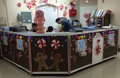 an office decorated with gingerbreads and candy canes