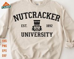 a sweater with the words nutcracker university printed on it