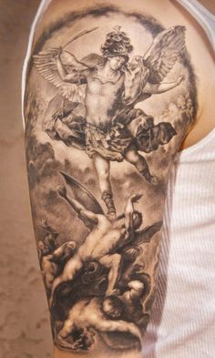 a man's half sleeve with an angel and demon on the back of his arm