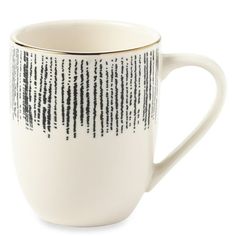 a white coffee cup with black lines on it