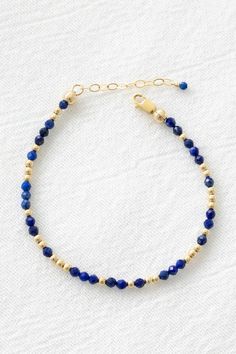 14k gold filled bracelet with 3mm lapis lazuli gemstones and 2.5mm gold filled beads Comes with an attached 1" extender chain! If you would like a different length that is not listed, please contact us for a custom order! Bar Jewelry, Lapis Lazuli Beads, Jewelry Workshop, Crystal Beads Bracelet, Bracelet Ideas, Anklet Bracelet, Stamped Jewelry, Beads Bracelet, Jewelry Inspo