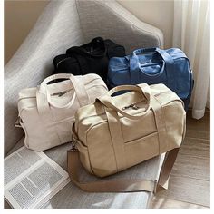 Material: 100% Canvas Size: 32cm X 13cm X 25cm Colors: Black, White ,Blue ,Khaki Usage: This crossbody canvas bag is suitable for daily, school and work. Large capacity: Perfect size canvas bag for your daily accessories such as boos, cell phone, cards or laptop. Can fit 14 inches laptop. (All the things we sell are filmed in real kind,But the light and the display are different,Please allow a bit of color error.) Vintage Canvas Bags, Shoulder Bag For School, Tote Bags For School, Daily Accessories, School Tote, Over The Shoulder Bags, Canvas Messenger Bag, Cross Body Bags, Chain Crossbody Bag