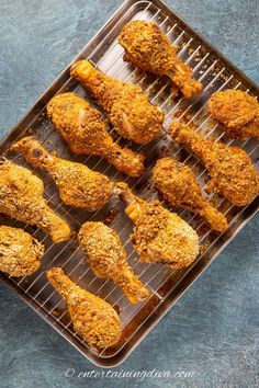 baked chicken wings on a cooling rack ready to be cooked in the oven for dinner