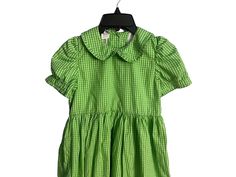 Vintage green and white girl's dress, tag says Oriental Express, sz 8, 55% cotton, 45% polyester. Dress buttons in the back, has puffed sleeves, 2 layers, has belt loops but no belt. Dress is in great condition. Casual Green School Dresses, Green Casual School Dress, Green Short Sleeve Dress For Formal Occasions, Green Cotton Dress For Dress-up, Girls Green Dress, Girl Green Dress, Platform Wedges Shoes, Girls White Dress, Dress Buttons