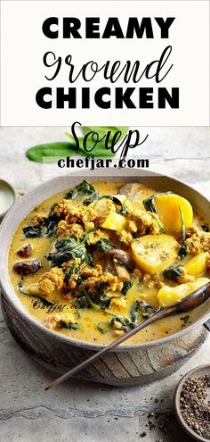 creamy chicken soup with spinach and potatoes in a bowl