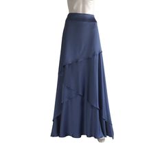 "It is made from soft and good quality Silk fabric. This is made to order in your measurements. Skirt length: 38\" .It can be made longer or shorter. It is made with a zipper. You can choose other colors from the color chart. When you order please give me your measurements: 1: The length of the skirt from the top of the waistline to the bottom hem. 2: Waist ( where you want the waistline to be). 3: Hips ( around the fullest part) 4: And your color choice. *When you order will have a place to wri Elegant Solid Tiered Skirt, Elegant Solid Color Tiered Skirt, Blue Flowy Gathered Mini Skirt, Flowy Long Draped Skirt, Elegant Blue Asymmetrical Skirt, Asymmetrical Solid Color Skirt For Evening, Blue Tiered Lined Maxi Skirt, Blue Tiered Maxi Skirt With Lining, Fitted Blue Elegant Wrap Skirt