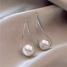 Faux Pearl Wire Earrings Silver Tone Great For Everyday Or Office Wear Or Anytime! Eardrop Width: .6” Height: 1.6” New White Drop Pearl Earrings For Party, White Teardrop Pearl Earrings For Party, Chic White Pearl Earrings With Ear Wire, White Metal Teardrop Earrings, White Hypoallergenic Pearl Earrings For Party, Trendy White Pearl Earrings For Formal Occasions, Hypoallergenic White Pearl Earrings For Party, Chic White Teardrop Pearl Earrings, White Teardrop Pearl Earrings