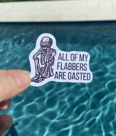 someone holding up a sticker that says all of my flabbers are gassed