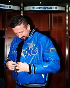 Orlando Magic Jeff Hamilton NBA Blue Leather Jacket Blue Leather Outerwear For Streetwear, Jeff Hamilton Jackets, Luxury Blue Varsity Jacket For Streetwear, Luxury Blue Leather Jacket With Long Sleeves, Blue Varsity Jacket, Luxury Blue Leather Outerwear, Jeff Hamilton, Orange Puffer Jacket, Varsity Letterman Jackets