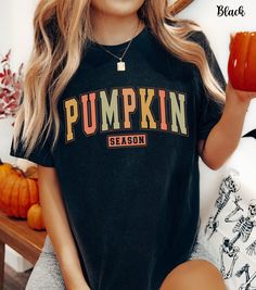 Celebrate the spirit of autumn with our pumpkin season shirt, perfect for pumpkin patch adventures and cozy fall days! This retro fall shirt features "Pumpkin Season" in festive autumn colors, adding a charming touch to your fall wardrobe. Made with Comfort Colors fabric, this pumpkin patch shirt offers a soft, comfortable fit that you'll love to wear all season long. Whether you're looking for pumpkin crewnecks, autumn tees, or cute fall shirts, our pumpkin season shirt is the ideal choice for Fall Cotton Tops With Letter Print, Relaxed Fit T-shirt For Fall, Cotton Letter Print Shirt For Fall, Cotton Shirt With Letter Print For Fall, Fall Cotton Shirt With Letter Print, Fall Cotton Shirt In Orange, Trendy Crew Neck Shirt For Fall, Orange Cotton Shirt For Fall, Trendy Fall Crew Neck Shirt