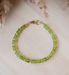 natural green peridot bracelet gold beads Adjustable Green Beaded Bracelet With Gemstone, Peridot Bracelet Gemstones, Handmade Adjustable Lime Green Bracelets, Silver Bracelets With Peridot Gemstone, Peridot Beads Jewelry, Bohemian Green Peridot Jewelry, Green Peridot Bohemian Jewelry, Green Bohemian Peridot Jewelry, Green Peridot Bracelet Jewelry