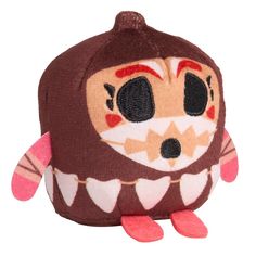 a brown and pink stuffed animal with big eyes