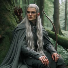 a man with long grey hair sitting in the woods