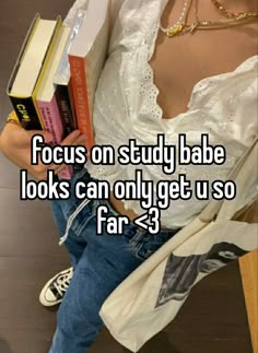 a woman sitting on a bench with books in her lap and the caption focus on study babe looks can only get u so far?