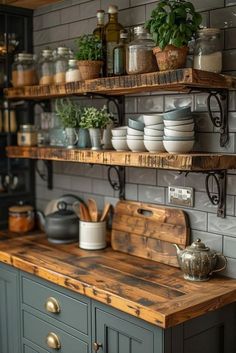 the shelves are filled with pots, pans and other kitchen items on wooden counters