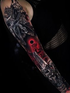 a woman's arm with a tattoo on it and a skull in the middle