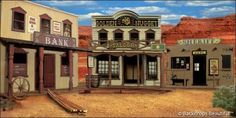 a painting of an old western town in the desert