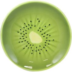 a green bowl with holes in the center