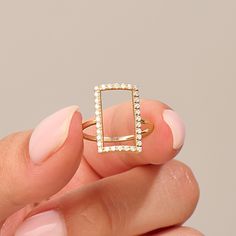 Rectangle Statement Ring 14k Real Solid Gold 14k 10k 18k Real Solid Gold Open Pave Rectangle Statement Ring is available in Yellow White Rose Gold. Make a statement with this dainty and versatile ring, suitable for everyday wear or as an accent piece for special events. It complements any outfit and effortlessly enhances your style.  Ring Details  ❥ 14k Yellow Gold(also in 10k,18k)  ❥ Gold Color Options; Solid Yellow Gold, White Gold, Rose Gold  ❥ Band Width: 1.35 mm  ❥ Top Width: 17.65x10.40mm Modern Rectangular Diamond Ring With Single Cut Diamonds, Modern Rectangular Diamond Ring With Prong Setting, Modern Rectangular Prong Set Diamond Ring, 14k Gold Rings With Diamond Accents, Square Cut, Modern Square Cut Diamond Ring For Gift, Modern Square Cut Diamond Ring As Gift, Gold Rectangular Minimalist Diamond Ring, Gold Cubic Zirconia Rectangular Rings, Minimalist Rectangular Diamond Ring In Yellow Gold