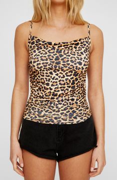 Ruching at the sides creates a drapey cowl neckline on this cami covered in fierce leopard print. Exclusive retailer 20" length (size 8) Cowl neck Adjustable straps Partially lined 96% polyester, 4% elastane Machine wash, line dry Imported Fitted Cowl Neck Tank Top For Summer, Stretch Sleeveless Leopard Print Top, Leopard Print Cami Top For Spring, Leopard Print Sleeveless Tank Top For Party, Stretch Tiger Print Top For Summer, Summer Leopard Print Cami Top, Leopard Print Cami Top For Summer, Summer Leopard Print Camisole Top, Leopard Print Camisole Top For Spring