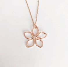 Necklace TIARE - Hawaiian flower necklace - flower pendant necklace - Hawaiian jewelry (N253) Delicate Rose Gold Pendant Flower Necklace, Minimalist Flower Necklace With Flower Charm, Rose Gold Flower Charm Necklace With Delicate Chain, Rose Gold Flower Necklace With Delicate Chain, Minimalist Rose Gold Necklace With Flower Charm, Delicate Flower Shaped Necklace With Delicate Chain, Minimalist Rose Gold Flower Charm Necklace, Hawaiian Flower Necklace, Hawaiian Flower