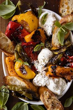 a white bowl filled with different types of food