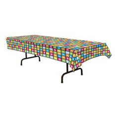 a rectangular table with colorful squares on the top and black metal legs, in front of a white background