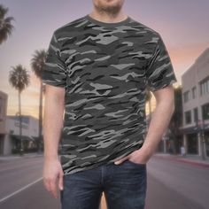 Step up your style with our Unisex Neutral Gray Tiger Stripe Camo T-Shirt. Featuring a striking tiger stripe camo pattern in a versatile gray, this bold tee offers a unique twist on classic camouflage. Crafted from soft, high-quality polyester, it ensures all-day comfort and durability. The unisex cut provides a relaxed fit for everyone, making it perfect for outdoor activities, casual events, or lounging at home. Features: Bold Neutral Gray Tiger Stripe Camo Design Soft, Durable Polyester Fabric Relaxed Unisex Fit Versatile Style for Any Occasion Easy Care: Machine washable Elevate your wardrobe--order yours today! Tiger Stripe Camo, Versatile Gray, Camo Designs, Tiger Stripes, Versatile Style, Step Up, Outdoor Activities, Camouflage, Dark Grey