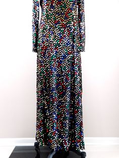 "This is an elegant 1970's vintage evening gown by Pat Sandler. It is beautifully embellished with sequins on a sheer shell and also has a slip underneath. It's in excellent condition! Bust - 34/36\" Waist - 28/30\" Hips - 36/38\" Total Length - 54\" This dress comes from a pet-free and smoke-free home. If you would like more info or have any questions, please don't hesitate to ask!" Sequined Gown, Vintage Evening Gowns, Sequin Evening Gowns, Sequin Maxi Dress, Sequin Maxi, Sequin Gown, 70s Vintage, Evening Gown, Saks Fifth Avenue