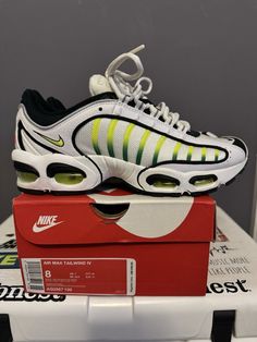 Elevate your athletic game with these Nike Air Max Tailwind 4 sneakers in size 8. With a stylish white and black colorway, these shoes are perfect for any workout or casual day out. The manufacturer color includes a pop of Aloe Verde, adding a unique touch to this classic sneaker. Designed for men, these sneakers are part of the Nike Air Max product line and feature a tailwind silhouette. The style code is AQ2567-100 and the shoes were released in 2019. Don't miss out on the opportunity to add these OG Nike Air Max Tailwind 4 sneakers to your collection. Dynamic White Sneakers For Streetwear, White Breathable Custom Sneakers, White Breathable Functional Custom Sneakers, Functional Breathable White Custom Sneakers, Functional White Breathable Custom Sneakers, Athleisure White Sneakers With Air Max Cushioning, Nike White Custom Athleisure Sneakers, Nike White Custom Sneakers For Athleisure, Sporty White Custom Sneakers With Air Cushioning