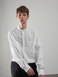 - Half button pullover shirt- China collar- Cotton blend- Comfortable fit - Long length sleeves- Oversized fit- Concealed button placket Measurement(in.)M - Length:29.9”, Shoulder width:20.8”, Chest width:22.8”, Sleeve length :25.2”L  - Length:30.3”, Shoulder width:21.6”, Chest width:24”, Sleeve length :25.6”* Model Info - Height :6’1”, Bust:31.5”, Waist:27.1”, Hips:36.2”, Large size                   Composition & Care- Outshe Casual White Blouse With Stand Collar, Classic Stand Collar Top With Button Closure, Classic Tops With Stand Collar And Button Closure, White Stand Collar Top With Button Closure, Classic Top With Stand Collar And Button Closure, White Stand Collar Shirt With Button Closure, Classic Tops With Button Cuffs And Stand Collar, Classic Tops With Stand Collar And Button Cuffs, White Dress Shirt With Button Closure For Fall