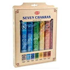 seven chakras in a cardboard box with different colors and designs on the front