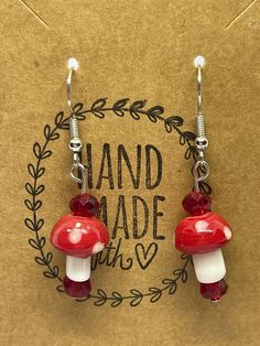 "Title: \"Glass Mushroom Bead Earrings - Whimsical Forest Delight for Your Ears!\" Description: Step into a world of enchantment with our Glass Mushroom Bead Earrings, a whimsical tribute to the magic of the forest. Each pair of these earrings is a tiny masterpiece, handcrafted with care to capture the charm and wonder of mushrooms found deep in the woods. 🍄 **Forest Magic These earrings are a nod to the mystical allure of the forest, where mushrooms symbolize growth, renewal, and a connection to nature. They are perfect for those who appreciate the beauty of the outdoors. 🌿 **Handcrafted Elegance Crafted with attention to detail, these earrings feature delicate glass mushroom beads that are as intricate as the real thing. Their lifelike appearance adds a touch of artistry and charm to y Whimsical Beaded Earrings As A Gift, Whimsical Beaded Drop Earrings, Whimsical Mushroom-shaped Earrings For Gifts, Whimsical Beaded Earrings For Pierced Ears, Whimsical Beaded Earrings For Pierced Ears As A Gift, Whimsical Adjustable Beaded Dangle Earrings, Adjustable Mushroom Design Earrings As Gift, Cottage Core Mushroom, Video Game Jewelry