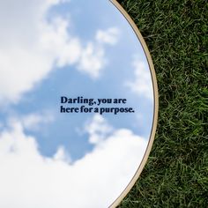 a mirror with the words daring, you are here for a purpose