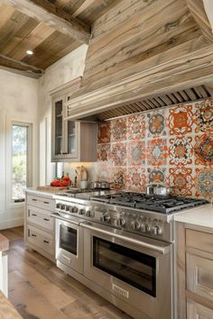 a stove top oven sitting inside of a kitchen next to a counter with an oven