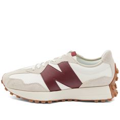 New Balance’s 327s are inspired by the brand’s ‘70s running sneakers and its archival 320, 355 and Supercomp designs. The 327s boldly reshape New Balance’s classic styles, featuring an angular silhouette, flared midsole and trail-inspired wraparound lug outsole. An oversized, asymmetrically applied ‘N’ logo completes the look. Suede and Nylon Uppers, EVA Foam Cushioning, Flared Midsole, Rubber Heel Wrap, Rubber Lugged Outsole. New Balance Women's WS327KA Sneakers in Moonbeam/Burgundy, Size UK 3 Burgundy Sneakers, N Logo, New Balance 327, Casual Sneakers Women, Yellow Cream, New Balance Sneakers, New Balance Women, Eva Foam, Sneaker Collection