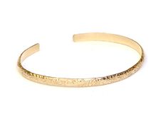 "Perfect for stacking or wearing alone as a dainty solid gold bracelet, this 14k floral bracelet features a sleek fit with a timeless botanical pattern. ►Our production time on custom orders averages 1-5 business days during off peak times, however we gladly will try to accommodate rushed and same day order requests. If you place a rushed order or same day request, please contact us through a convo or give us a call, as orders can sometimes take a bit to show up on our \"order page\" and technol Adjustable Etched 14k Gold Jewelry, Adjustable 14k Gold Etched Jewelry, Dainty 14k Gold Bangle For Formal Occasions, Elegant Adjustable 14k Stamped Bracelets, Dainty Adjustable Yellow Gold Cuff Bracelet, 14k Gold Engraved Cuff Bracelet, 14k Yellow Gold Etched Bracelets, Etched 14k Yellow Gold Bracelets, Elegant Etched Yellow Gold Bracelet