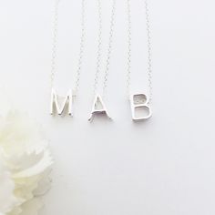 "Silver Initial Necklace | Letter Capital necklace | Alphabet Personalized Gift | Custom Letter Necklace | Sterling Silver 925 Jewellery A truly special single uppercase letter threaded onto delicate chain ,makes this necklace very personal. This simple monogram necklace is perfect for everyday wear. Great for layering ! Perfect for gift giving for your bff, or for someone close to your heart. All made of solid sterling silver 925. Depending on the letter - they measure 8 mm high and between 5-6 Everyday Silver Necklace With Custom Name, Silver Custom Name Charm Necklace For Everyday, Everyday Silver Charm Necklace With Custom Name, Everyday Sterling Silver Initials Charm Necklace, Minimalist Sterling Silver Name Necklace For Everyday, Everyday Minimalist Sterling Silver Name Necklace, Minimalist Sterling Silver Initial Pendant Name Necklace, Minimalist Initials Sterling Silver Necklace, Minimalist Letter Necklaces For Everyday